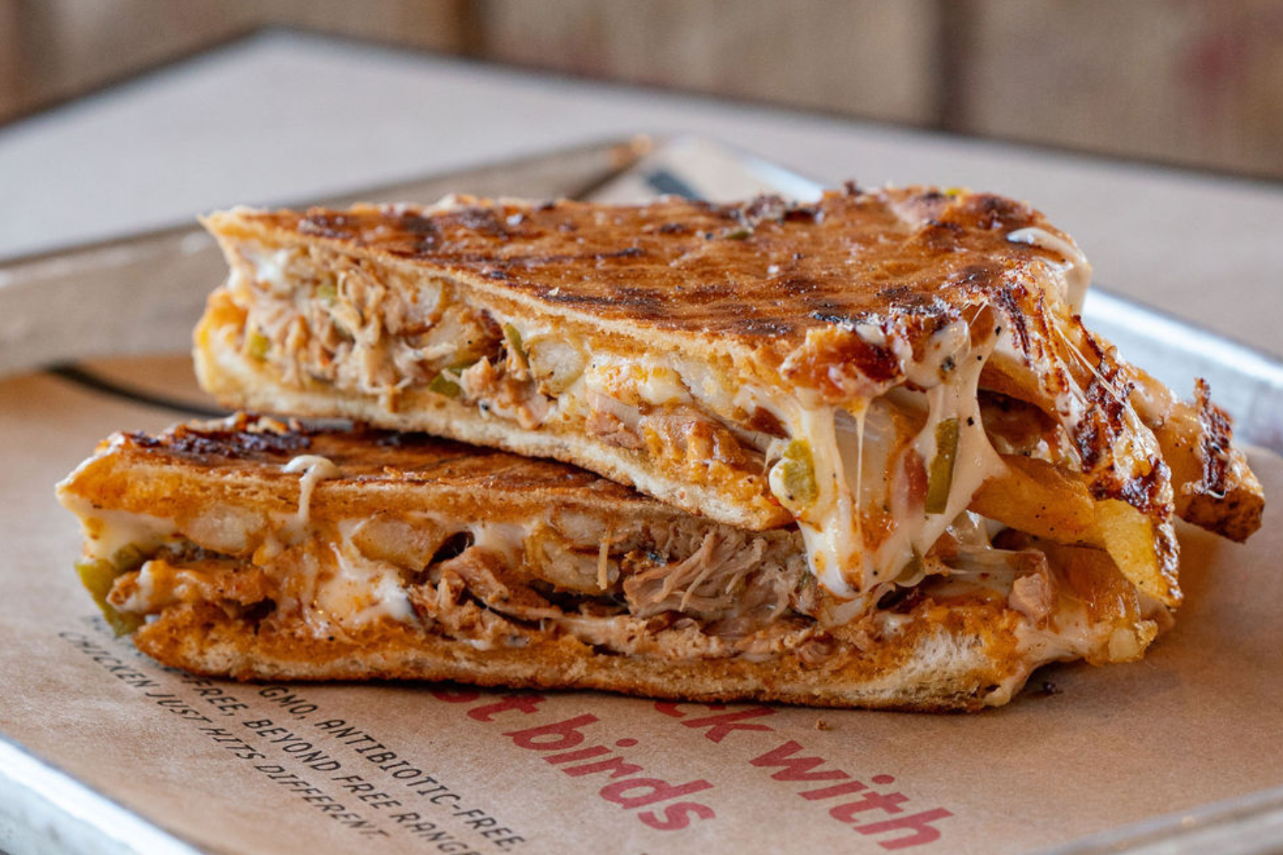 Melty chicken panini on a tray