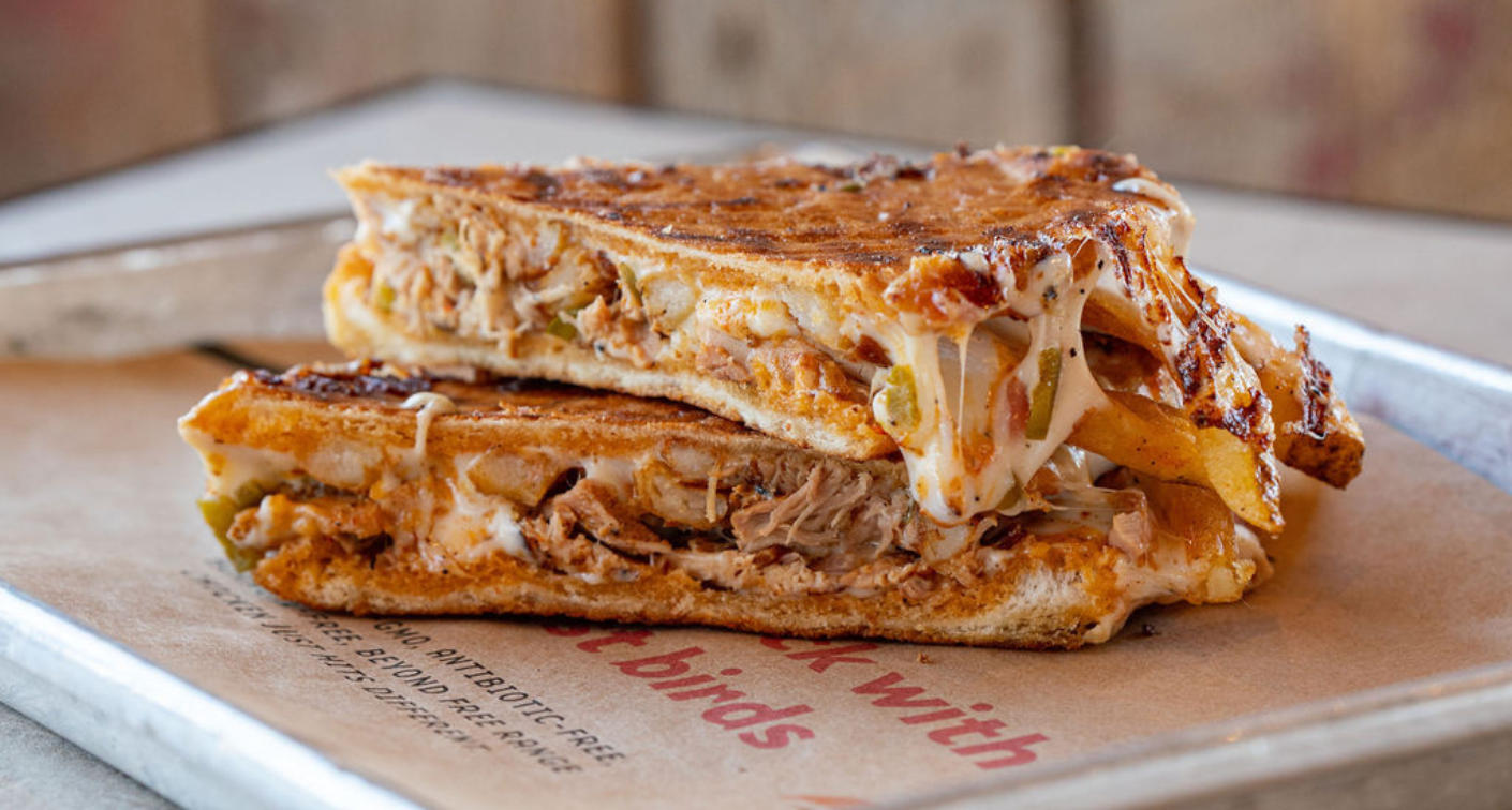 Panini sandwich stacked on each other on a tray