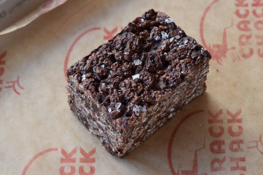 Dark chocolate rice krispie on a tray.